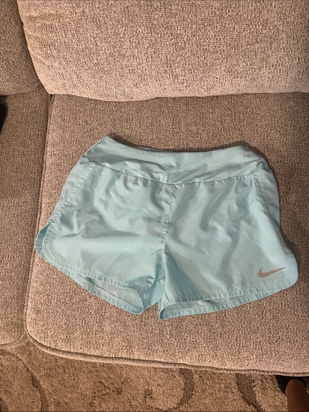 Nike Women's Mint Blue Athletic Shorts with Swoosh